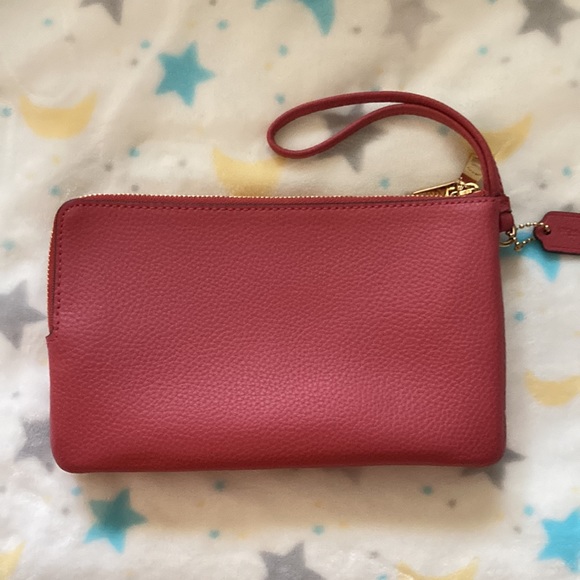 Coach pink wristlet. Never used. Great condition. - Picture 3 of 6